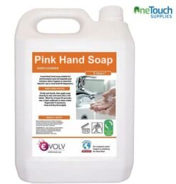 A bottle of pink liquid hand soap placed on a white surface.